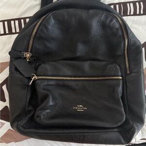 Coach Black Leather Backpack with Gold Accents
